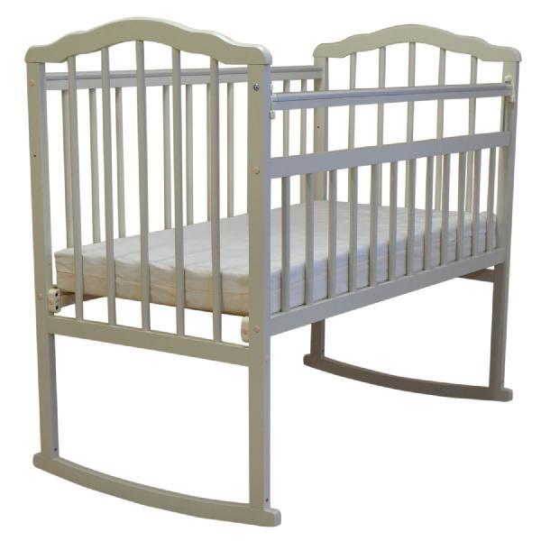 Кровать детская Гном 2 (колесо, качалка, опускная боковина, накладка ПВХ)