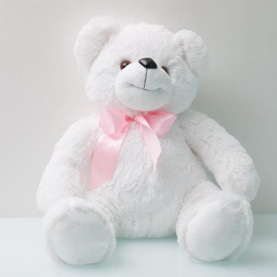 Мягк. игр. Медведь Дмитрий большой белый с бантом.